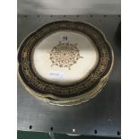 A late 19th century Coalport china Cabinet plate with raised gilt textured decoration together