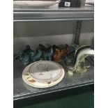 A collection of various Poole pottery glazed animals together with a Murano Art Glass sculpture