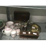 A 19th century Copeland glazed china dolls teaset together with a silver plated teapot, brass