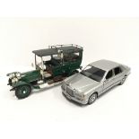 Two Franklin Mint 1/24 scale Rolls Royce cars: 1907 Rolls Royce Silver Ghost (VG/E, one small chrome