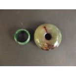 A jade ring and a jade roundall, 1½" diameter