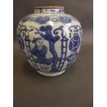 A Chinese blue and white porcelain storage jar decorated with children in a garden, dragon mark to