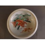 A Chinese porcelain brush wash, the interior decorated with a carp, seal mark to base, 4½" diameter