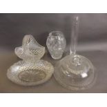 A moulded glass cake plate and dome, a Polish cut glass baluster vase, a cut crystal basket, a