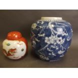 A Chinese Hawthorne pattern blue and white ginger jar, 4 character mark to base, and an orange