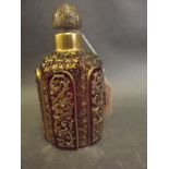 A good C19th Bohemian ruby glass bottle and stopper with raised gilt decoration, 5½'' high