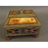 An Eastern sarcophagus shaped brass trinket box with enamelled and applied bone decoration, 4½" x 3"