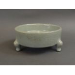 A Chinese celadon crackleglazed censer on tripod feet, seal mark to base, 5" diameter