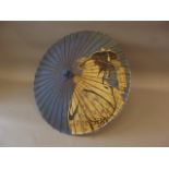 A Japanese bamboo and painted paper parasol decorated with a contemplative geisha, 27" long