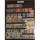 An album of 'All World' postage stamps, mostly C20th, and several loose sheets of mounted stamps