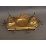 A Victorian style cast brass desk stand