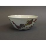 A Chinese Doucai enamel porcelain tea bowl with painted chicken decoration, 6 character mark to