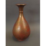 An unusual Oriental brass vase with patinated finish, seal mark to base, 8½" high
