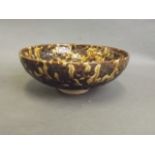 A Chinese tortoiseshell coloured drip glaze pottery bowl, 6" diameter