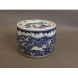 A Chinese blue and white porcelain pot and cover decorated with mythical creatures above waves, 6