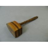 An olive wood gavel with mitre and compass decoration, the handle inscribed 'Jerusalem', 10" long