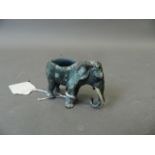 A cold painted bronze pin cushion in the form of an elephant, 2½" long