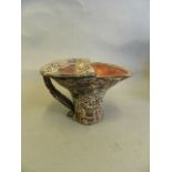 A Chinese horn libation cup with carved decoration of a bamboo forest, 4" high