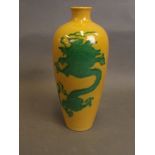 A Chinese yellow ground porcelain meiping vase with green enamel and incised dragon decoration, 6