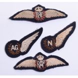 WW2 Royal Air Force Air Crew Insignia consisting of pair of padded Pilots wings, semi-padded pair of