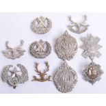 Nine Scottish Glengarry Badges and One Helmet Centre, consisting of early non voided centre