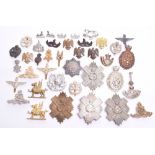 Selection of British Regimental Badges, consisting of cap badges, pouch badges, collar badges and