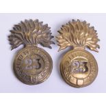 Scarce 23rd Royal Welsh Fusiliers Glengarry Badges, two examples in brass, one with two lug fittings