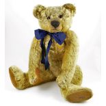 A large and early Chad Valley Teddy bear, English 1930’s the brown mohair bear with large orange