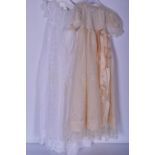 Two Victorian Christening Gowns, the first elaborate gown in fine Batiste, with tucked inserts and