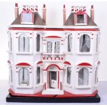 A large and attractive G & J Lines Bros number 24 dolls house, English circa 1900, the painted