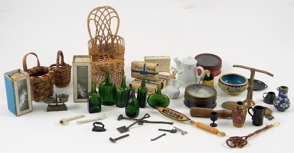 Collection of dolls house miniatures, including wicker chair and baskets, brass scales, set of green