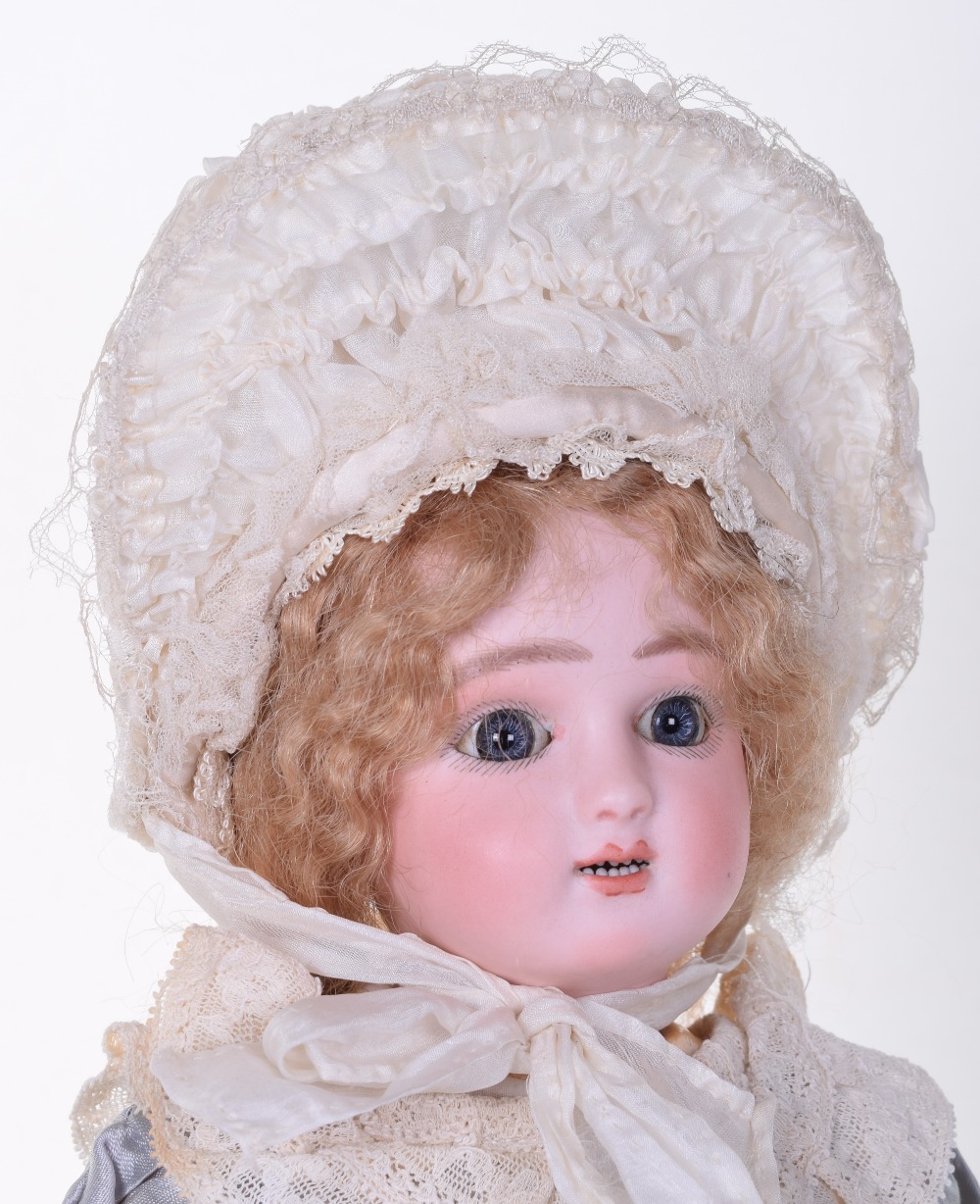 Steiner C bisque head Bebe, circa 1890, with blue glass lever-eyes, shaded lids and feathered - Image 2 of 2