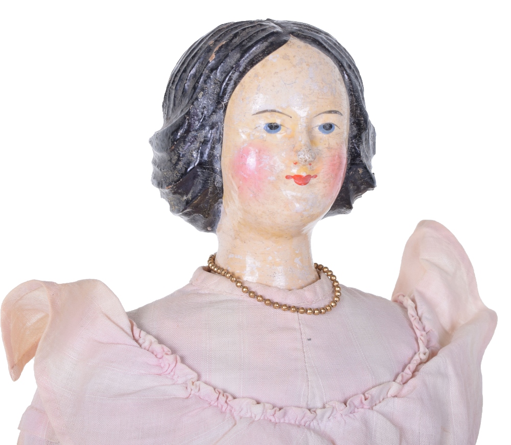 Carved wooden shoulder head doll, German circa 1860, with painted features, heavily carved painted - Image 2 of 2