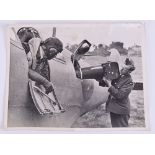 Grouping of WW2 Official Photographs, large format black and white photographs, most with typed