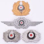 Selection of WW2 German Cap Insignias consisting of metal Kriegsmarine cap wreath with painted metal