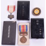 WW2 Japanese Medal Grouping, consisting of 8th class Order of the Rising Sun in black lacquer box,