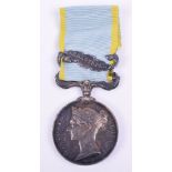 Crimea Medal 1854, with single clasp Sebastopol. Un-named example. Dark toned patina. Some contact