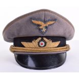 WW2 Luftwaffe Generals Peaked Cap, with bullion wire eagle and cockade insignia. Gold wire piping to