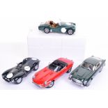 Three Auto Art Scale Models, Jaguar ‘E’ type, Jaguar ‘D’ type and Aston Martin DB5, 1:18 scale