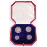 Edward VII 1903 Maundy Money Set, consisting of four coins, housed in gilt tooled red leatherette