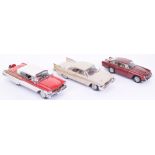 Three Danbury Mint Cars, including: 1957 Mercury Turnpike Cruiser,red/white body, 1958 Plymouth