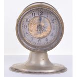 Small Table Top Clock, with the face stamped BRITISH UNITED CLOCK Co LTD BIRMINGHAM. White metal and