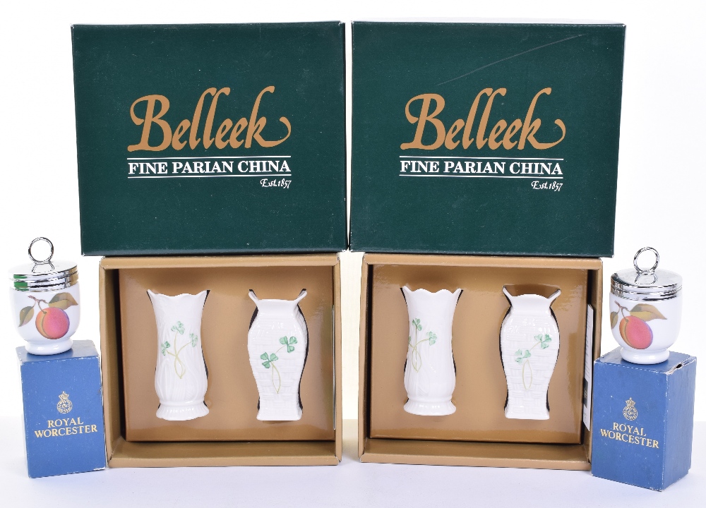 Two Boxed Irish Belleek Parian China Small Vases, decorated with hand painted Shamrocks, both sets