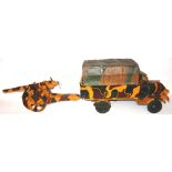 A large scale German WW II four wheel Truck with towed Artillery piece, camouflage finish,