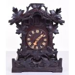 Black Forrest Cuckoo Table Clock, good quality striking pendulum movement, finely carved case, roman