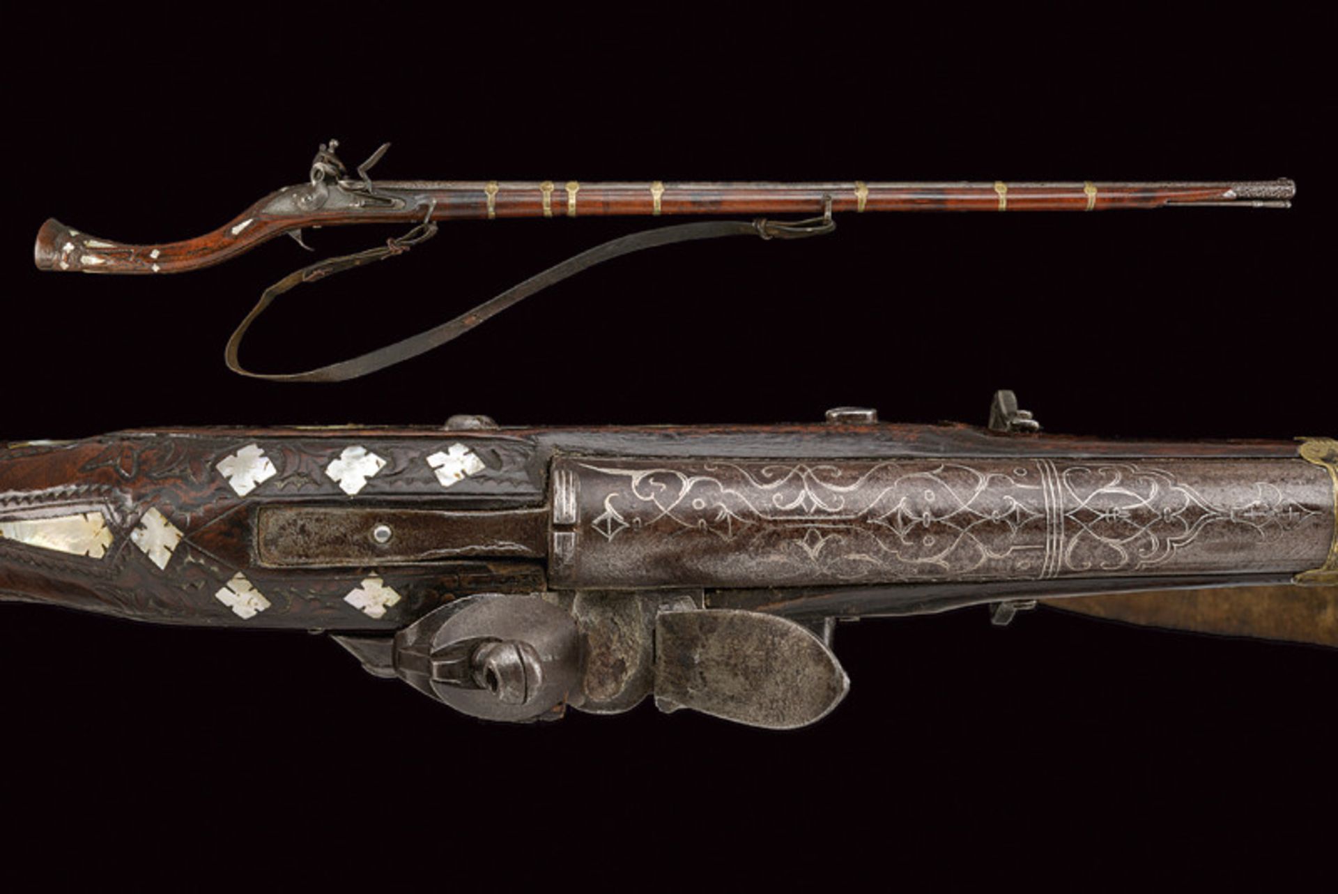 A Jezail flintlock gun with decorated barrel