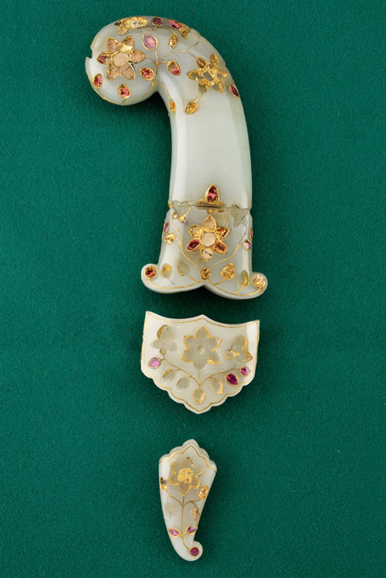 Jade grip and scabbard garniture of a Moghul kandshar, featuring gold and rubies