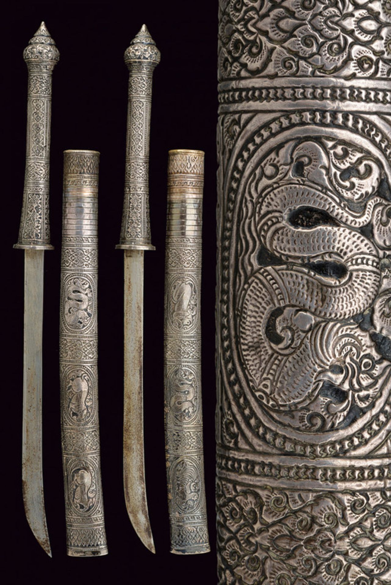 A pair of silver mounted Dha