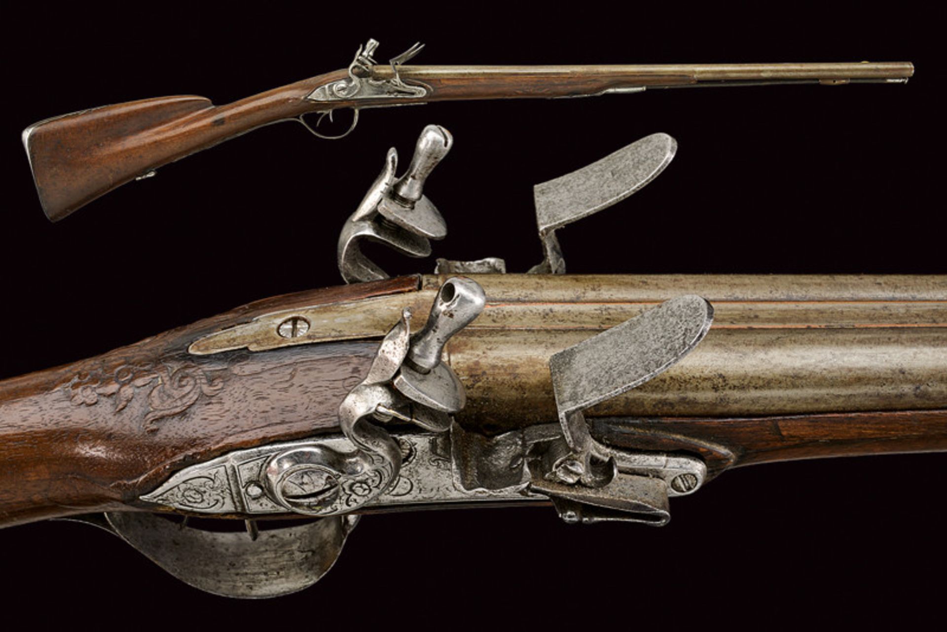 A double barreled flintlock shotgun