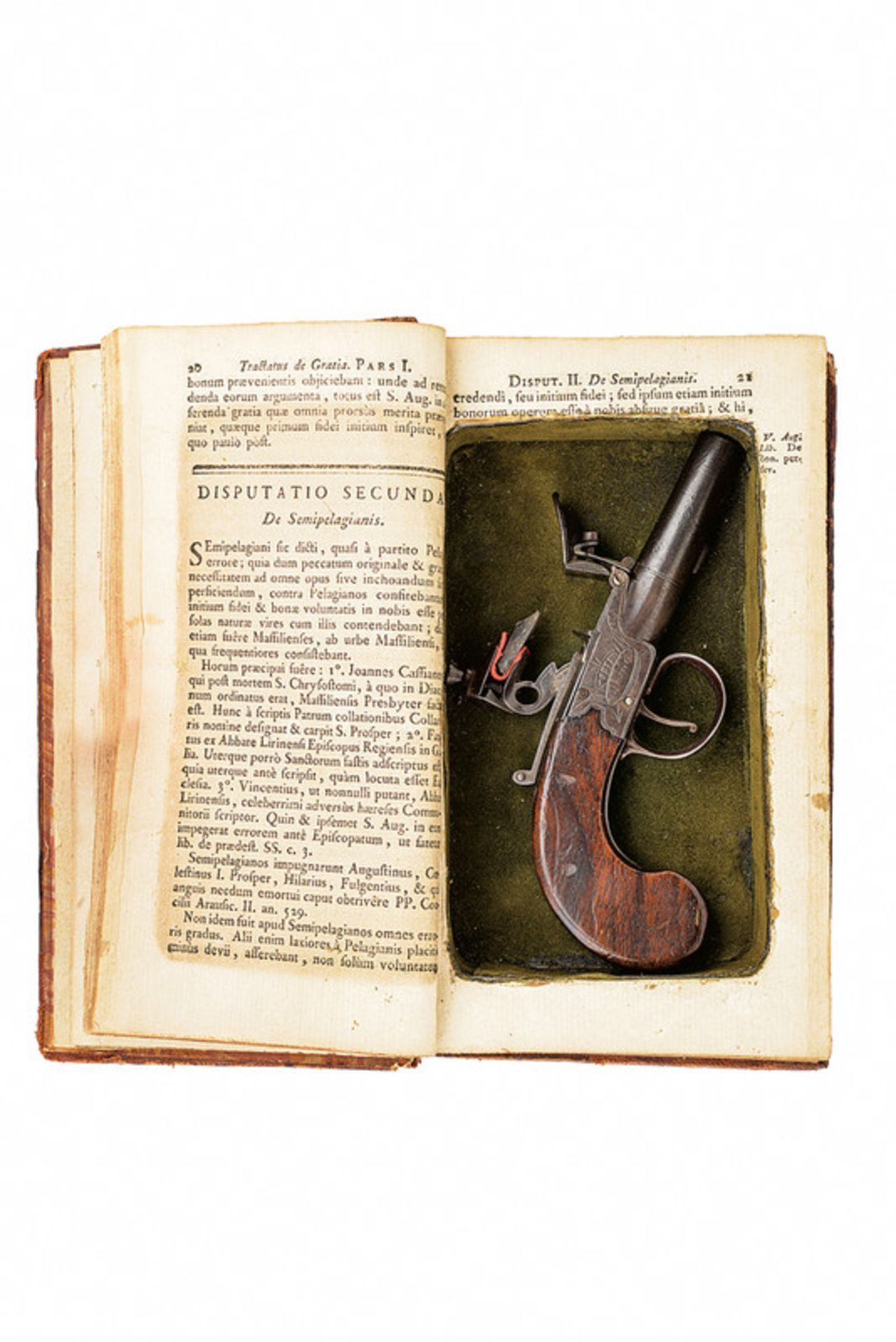 A flintlock pocket pistol hidden in a book dating: early 19th Century provenance: London Round,